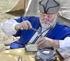 Ancient_Hungarian_-_traditional_coppersmith_master_at_work